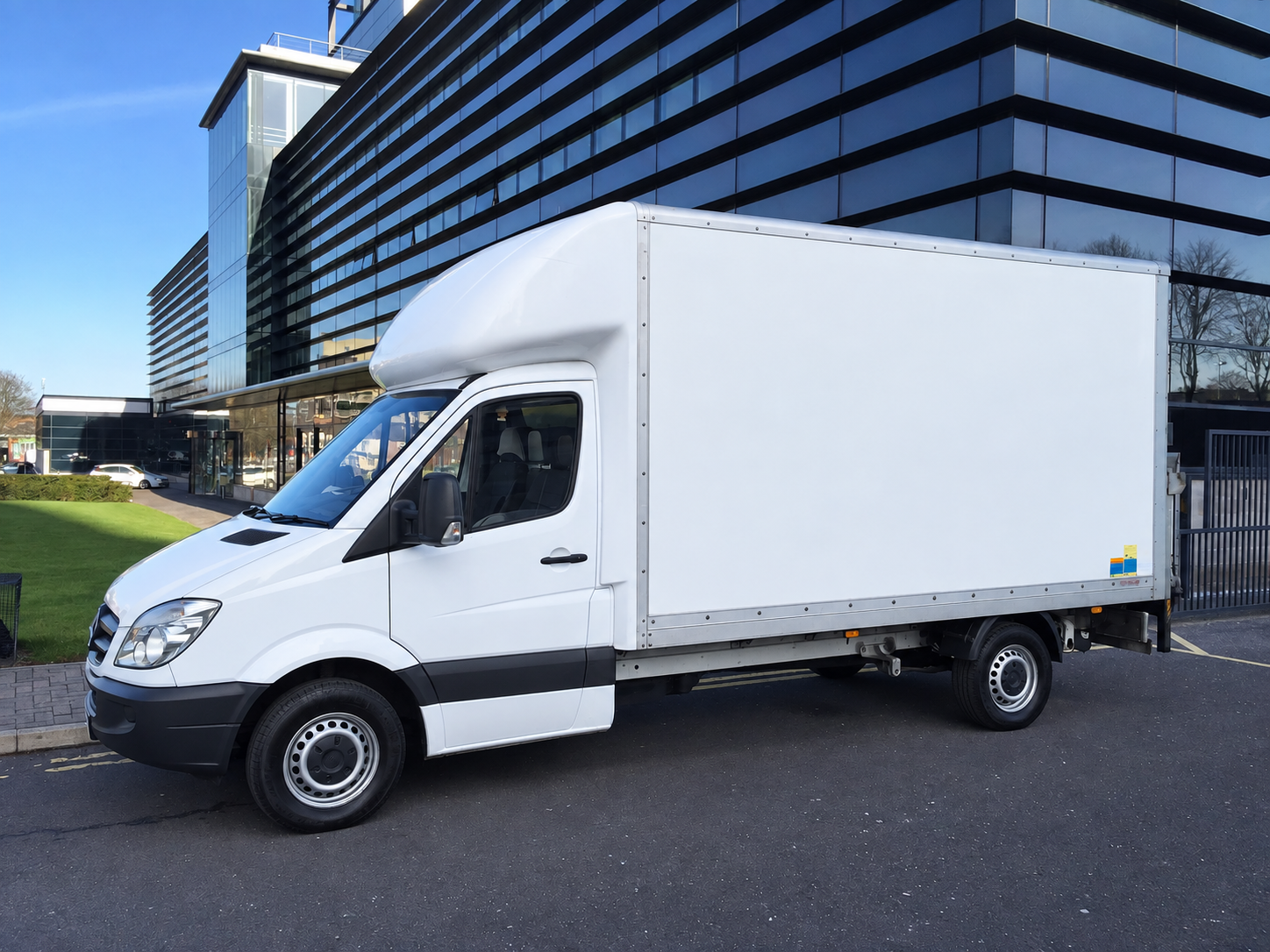Clean Newby Removals Mercedes Luton van with tail lift
